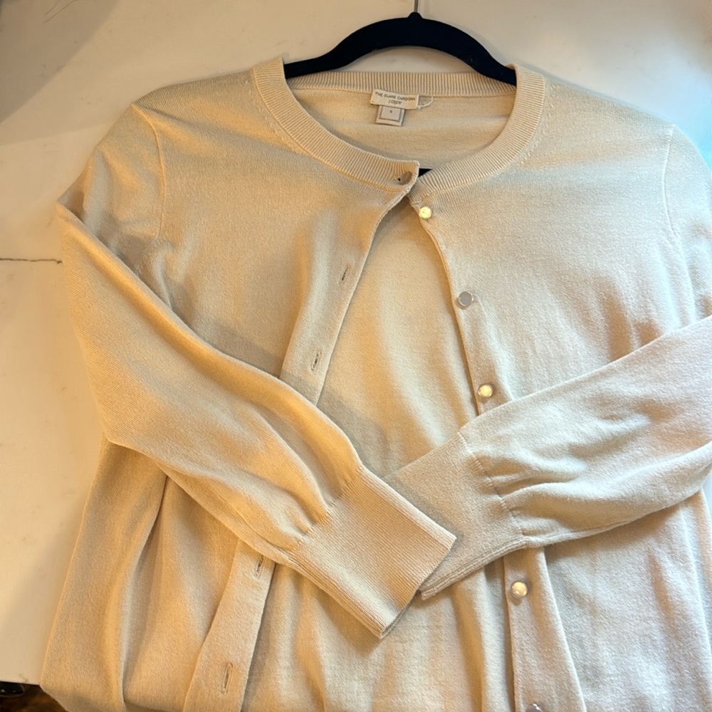 J.Crew cardigan, three-quarter sleeve buttoned. Tag is starting to fall off.